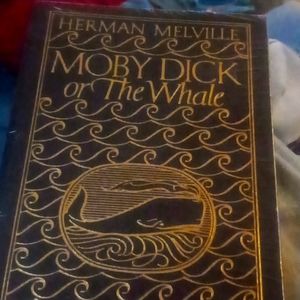 Leather bound 22k gold trimmed copy of MOBY DICK still in plastic